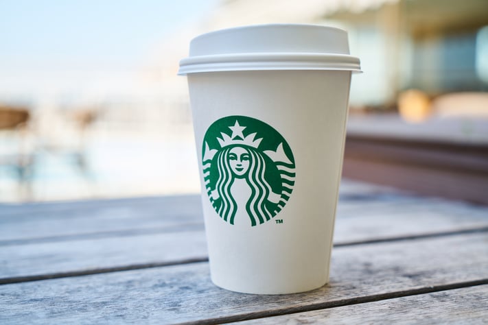 closed-white-and-green-starbucks-disposable-cup-1437318